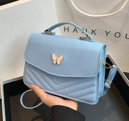 Butterfly Vibes – Blauw Tasje met Sparkle